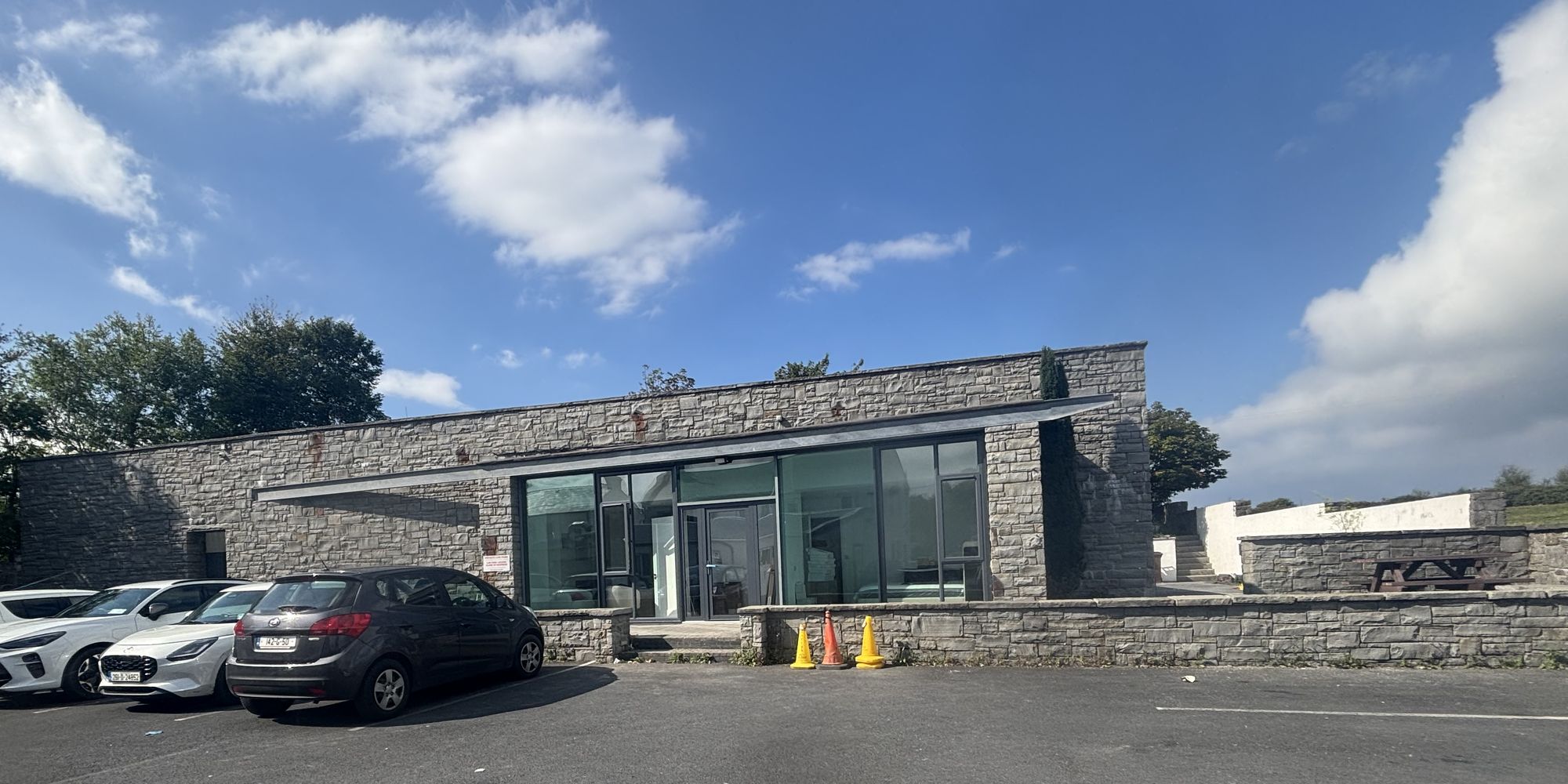 Modern office building in stone and glass