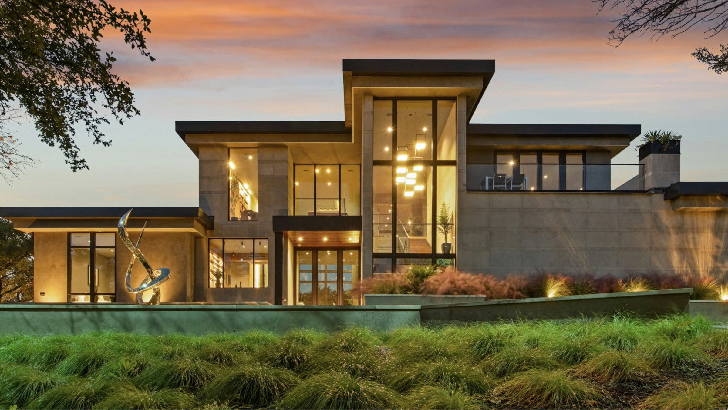 Modern house with large windows at dusk